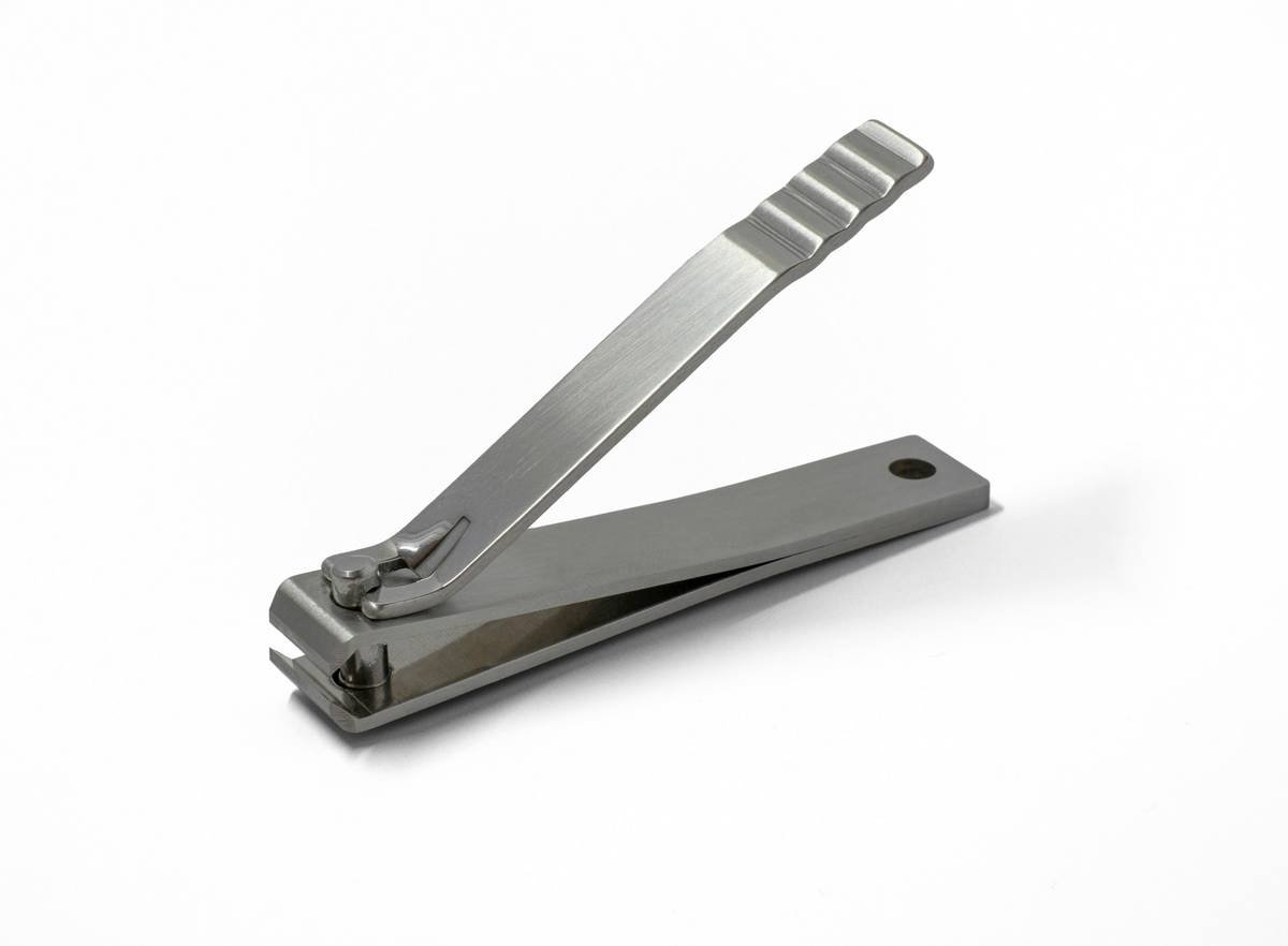 Side-by-side comparison of precision nail trimmer (slim, pointed, micro-serrated) vs. generic nail scissors (blunt, thick, smooth blades)