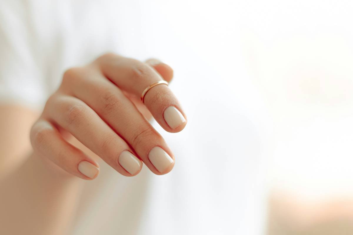 Close-up of precise nail shaper blades showing 45-degree bevel for clean cutting